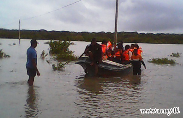 After 'Mandagal Aru' Bridge Closure, Troops Facilitate Passage Using Boats