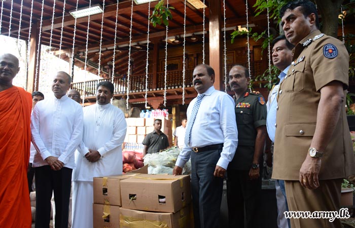 UPDATE: Gangaramaya Collected Relief Consignment Handed to Army for Distribution