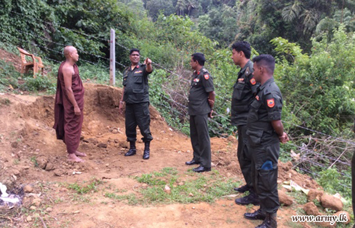 Troops Support Construction of Temple Wall