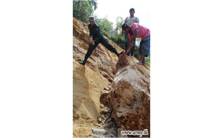 Troops Restore Close of Road