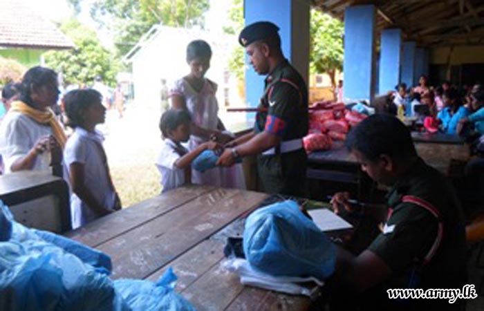 School Children Receive Sleeping Kits