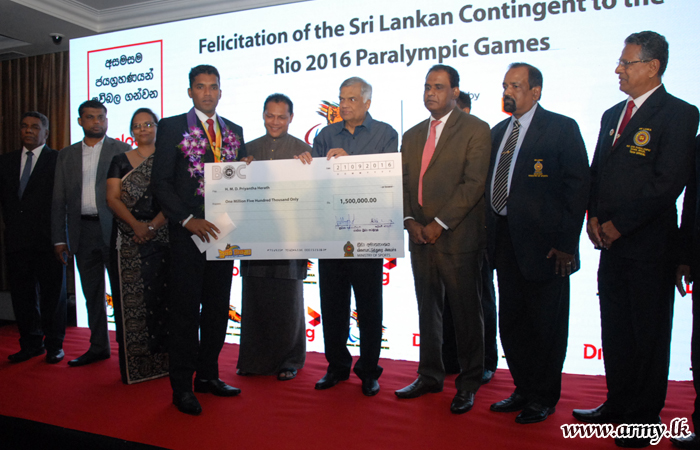 Bronze Medalist in Paralympics Felicitated & Rewarded by Prime Minister
