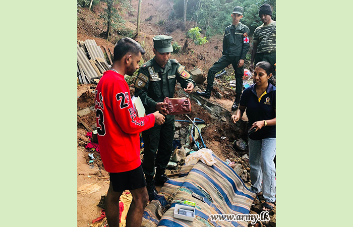 Troops Hand Over Recovered Valuables to Landslide Victim in Hanguranketha