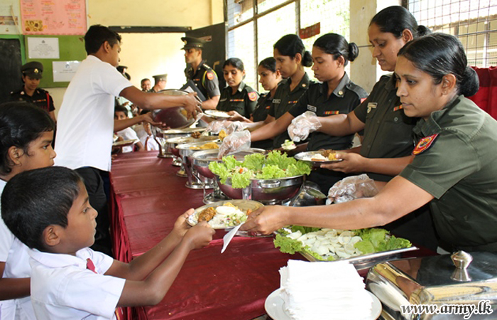 11 Div Troops Offer Lunch Treat to Students 