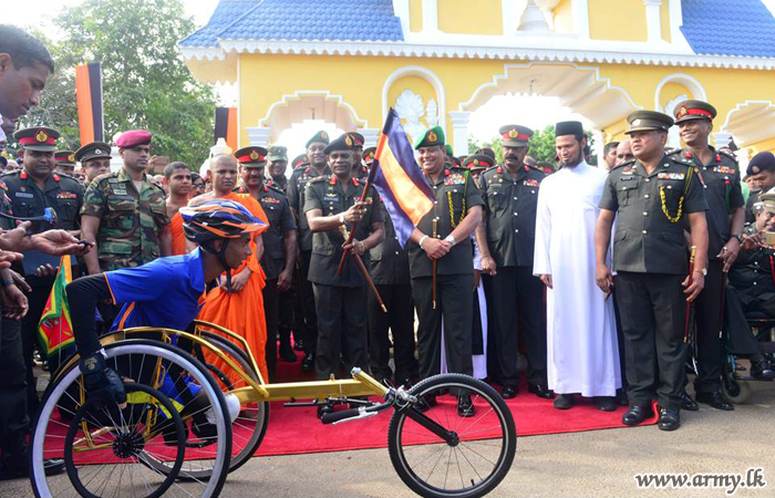 War Hero’s Unwavering Determination Moves Along in Wheelchair to Point Pedro  