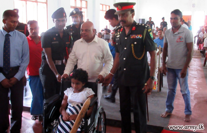 62 Division's Initiative Gets 50 Wheelchairs to the Disabled in Welioya Area