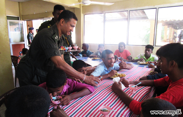 Troops Continue to Offer Meals to Orphanage