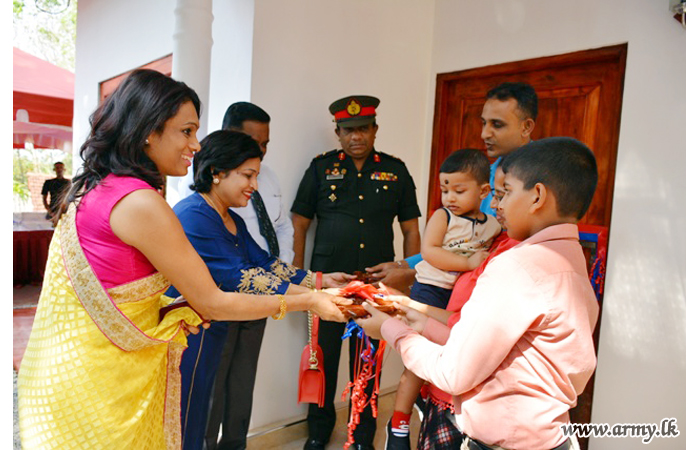 Tamil Donors Build Two New Houses for Two Disabled War Heroes & Distribute Schols to War Heroes' Children