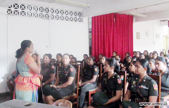 Woman Soldiers Listen to Pertinent Lecture