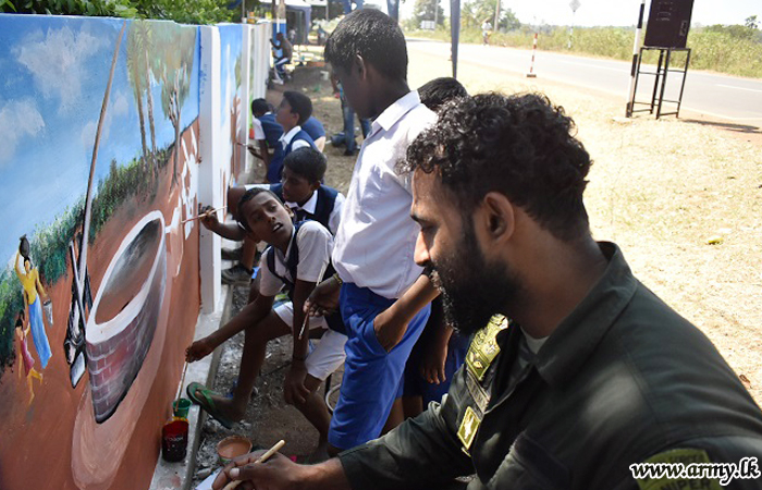 'Uthura Dakuna Yaakarana Sanhidiyawe Sithuwam Pawura' Paints Mallavi School Buildings