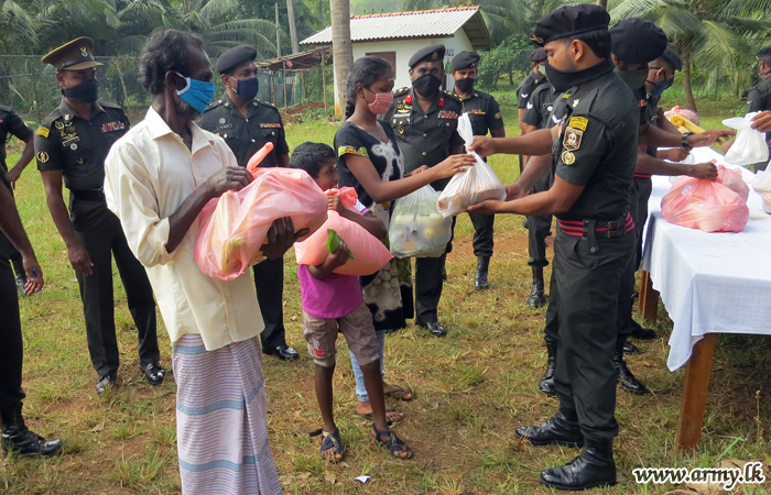 SF Regimental HQ Troops Give Away Relief Packs to Elkaduwa Villagers