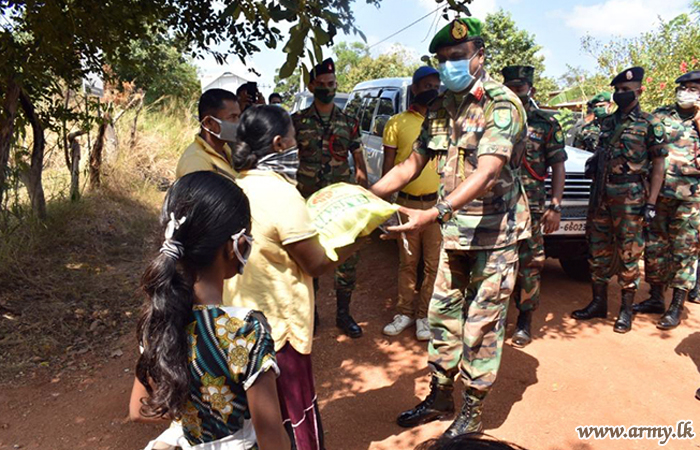 62 Division Troops Distribute 750 Relief Packs among Sampathnuwara Civilians