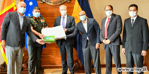 Head of NOCPCO Receives PPE & Gloves from Australian Department of Defence
