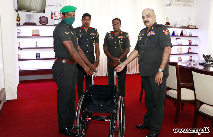 New Wheelchair Awarded to a Handicapped War Hero