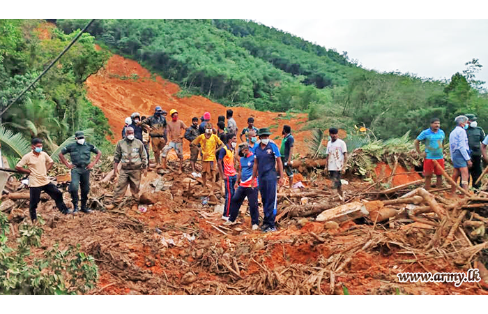 Troops in Disaster Relief Work Recover Dead Teenager & Buried Adults