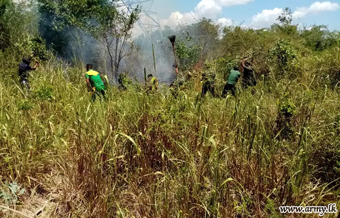 143 Brigade Troops Extinguish Sudden Bush-Fire