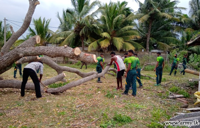 Troops Clear Tree Fallen in Temple Premises