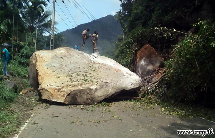 Troops Help Remove Boulder