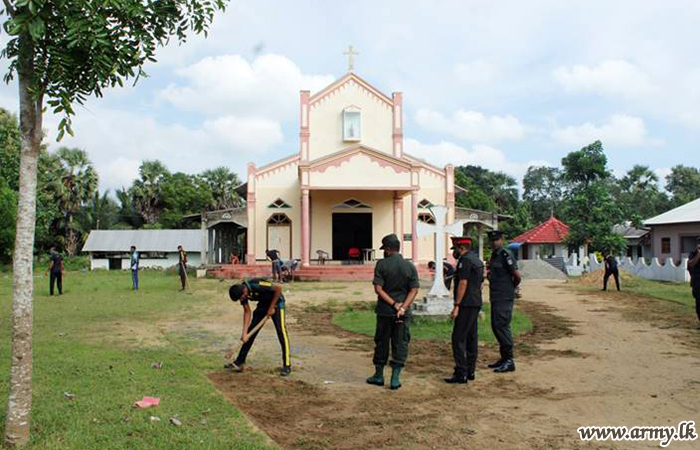Troops Clean up Church Premises for X'mas