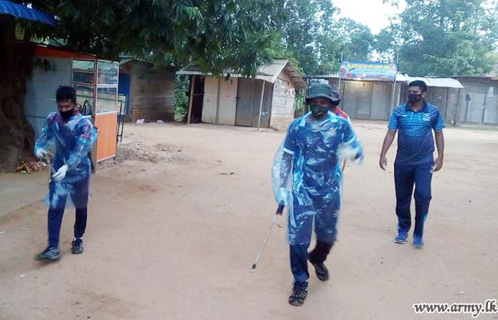 Troops Sterilize Puthukudiyrippu area in Mullaittivu against COVID - 19