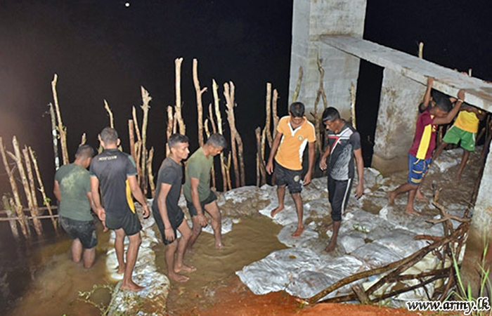 Troops Swiftly Mend Split in Marailluppaikulam Tank at Illeimaradankulam