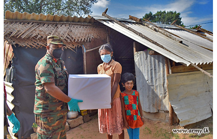 Troops Distribute Dry Ration Packets Organized by Them