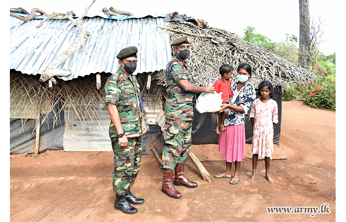 64 Division Troops with Sponsor's Support Distribute Dry Ration Packs
