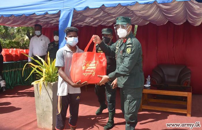 Air Mobile Brigade Troops Take Relief Packs to the Needy