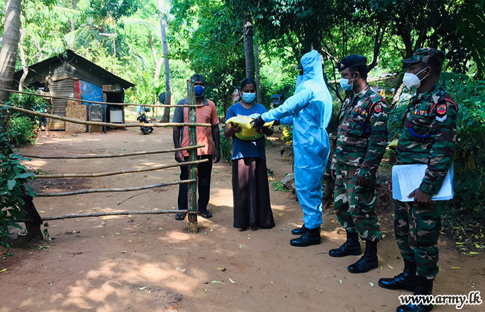 12 Division Troops Take Dry Ration Packs to Needy Families in Kataragama Area 