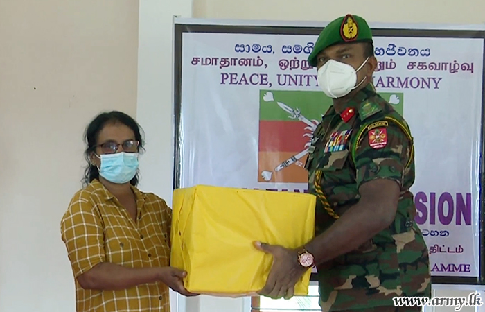 52 Division Troops Help the Poor Coordinating Relief Supplies