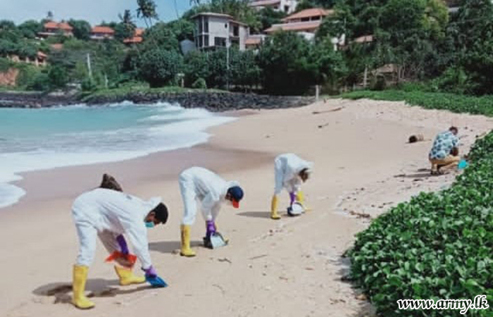 3 (V) GW Troops Collect Ship Debris along Walliwala Beach