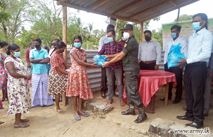 Troops Deliver Dry Ration Packs Sponsored by Philanthropist