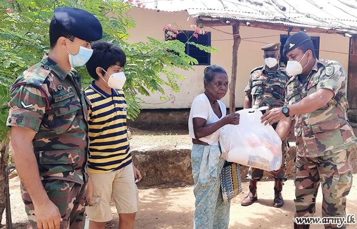 7 SLA Troops Distribute Relief Packs among the Poor