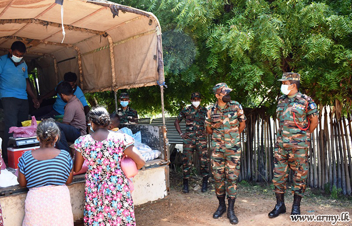 SFHQ-MLT Troops Take Vegetables to Civilians' Doorsteps 