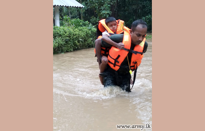 Troops Still at Work Providing Relief to Flood Victims 