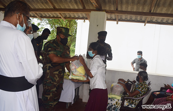 Troops Coordinate Distribution of Dry Ration Packs in Keviliyamadu