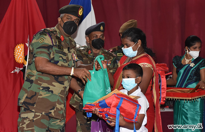 Puthumatalan Parents & Students Given Relief Packs by Monk