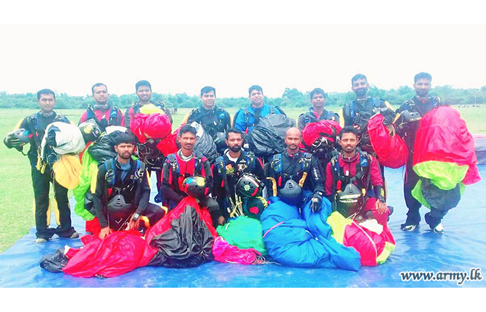Army Parachutists Form 11 Canopies