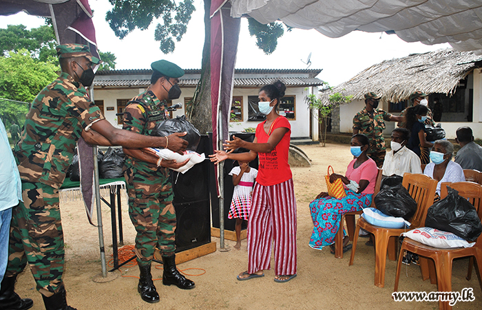 60 Low-Income Group Families Get Army-Coordinated Relief Packs