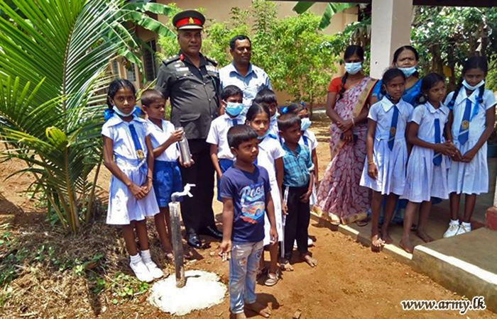 Troops with Sponsors Provide Drinking Water to Students