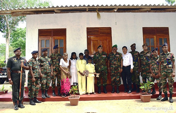 With Donor's Funds, 12 Division Troops Erect New Home for Shelterless Family 