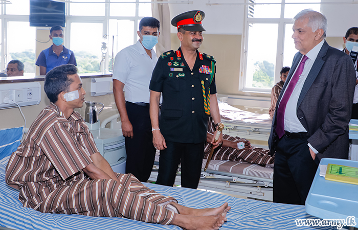 Hours After Taking Oath, Acting President Arrives at Colombo Army Hospital to See Injured Soldiers