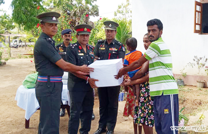 641 Brigade Troops Help the Family with Essential Dry Rations