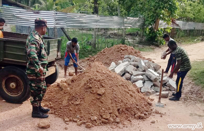 9 & 6 SLNG Troops Repair Road & Join Beach Cleaning Project