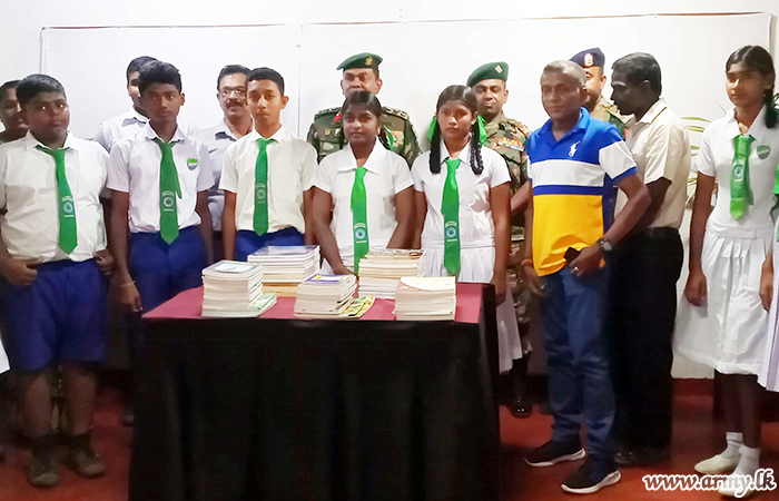 552 Brigade Troops with Support of National Library Services Get Books to School Library