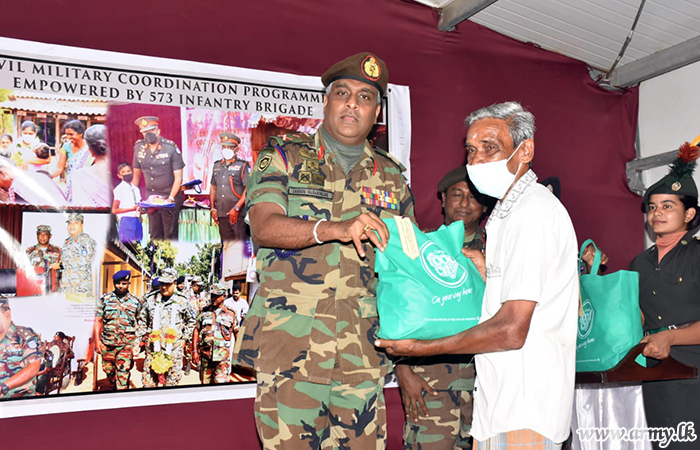 573 Brigade's Initiative Gets 50 Dry Ration Packs for Malayalapuram Families