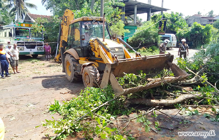 6 Field Artillery Troops Clear Road for Traffic