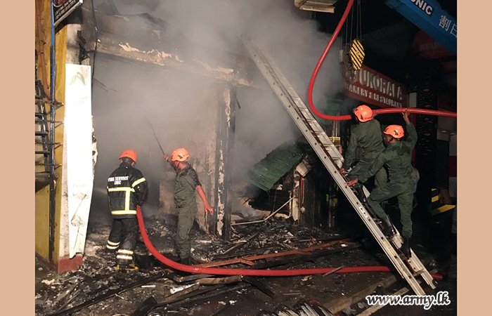 611 Brigade Troops Douse Footwear Shop  Fire