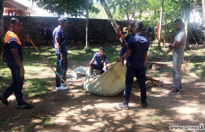 144 Infantry Brigade Troops Clean up Temple Compound on Request