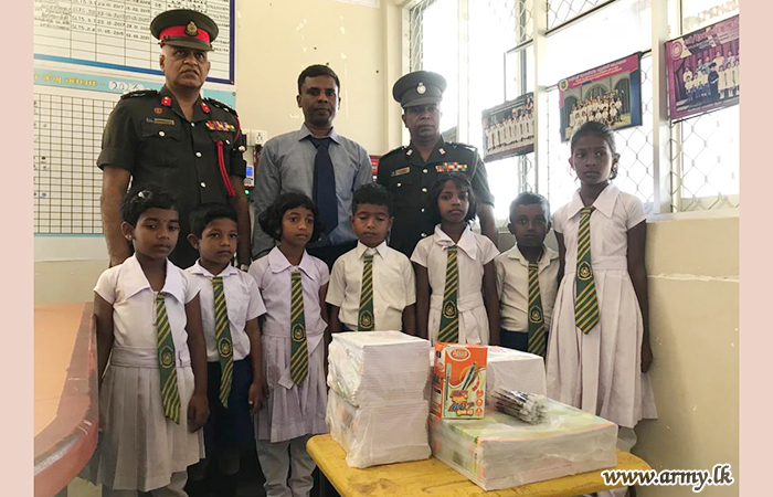 651 Infantry Brigade Troops Buy School Needs for 93 Deserving Students at Thewampiddy